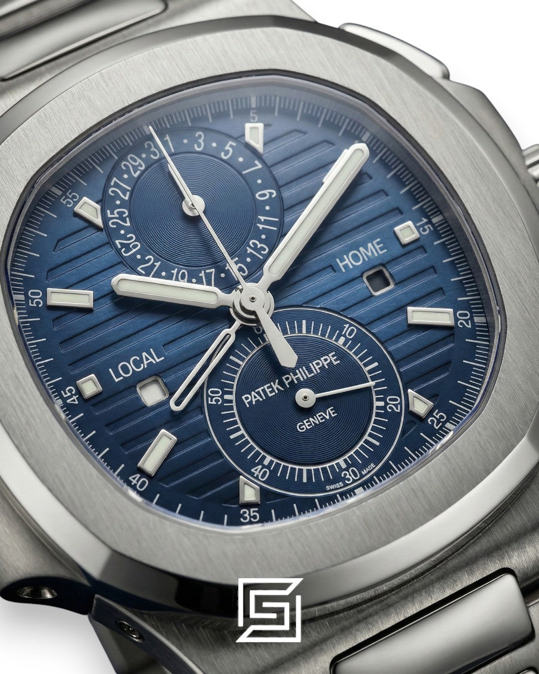 Patek Philippe Nautilus Travel Time – Blue Dial – Japanese Automatic Chronograph – Stainless Steel Bracelet