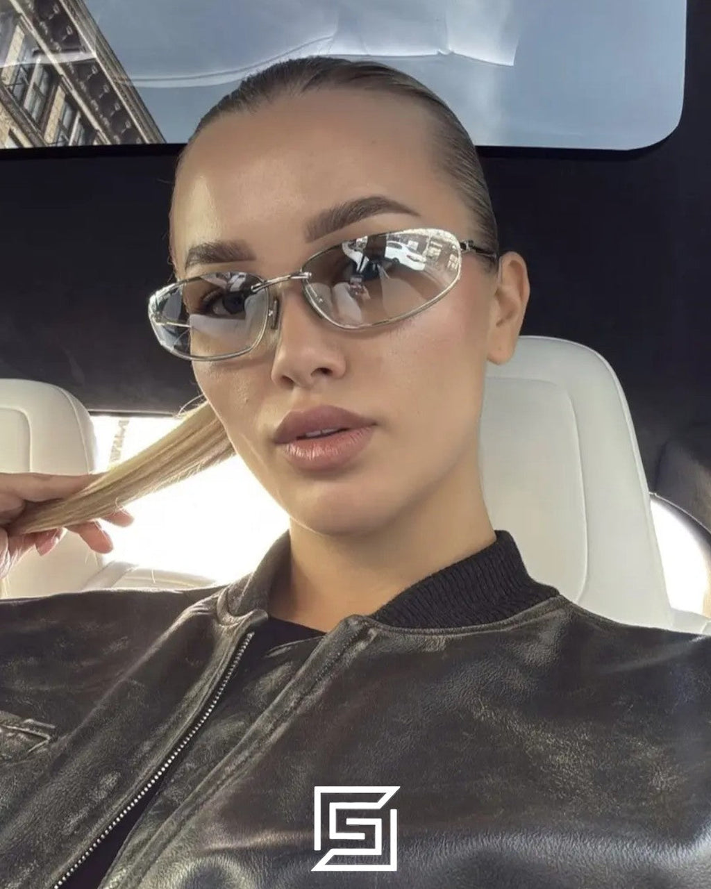 نظارة "ميوميو" (Miu Miu) موديل MUA50S بعدسات وردية وإطار فضي