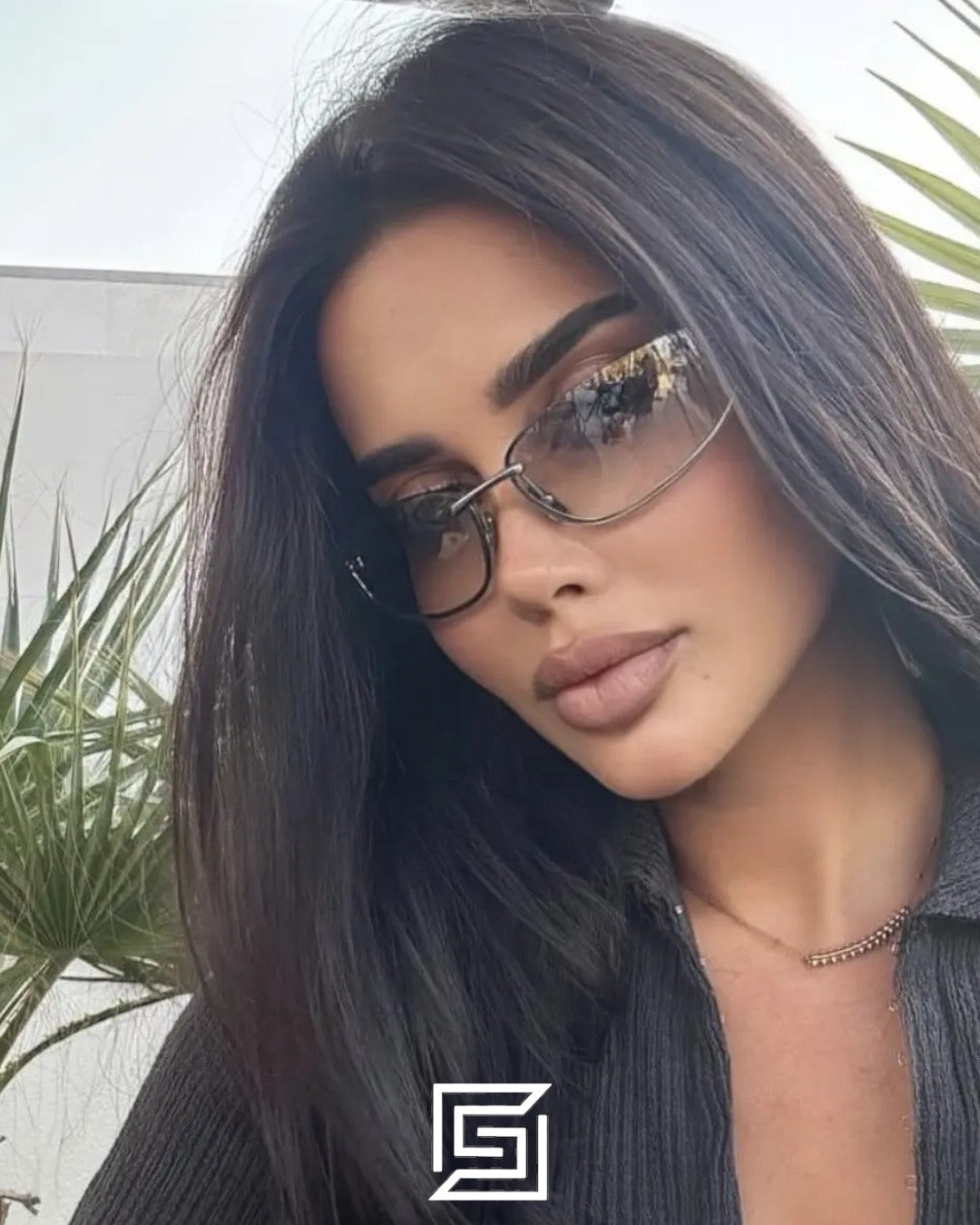 نظارة "ميوميو" (Miu Miu) موديل MUA50S بعدسات وردية وإطار فضي