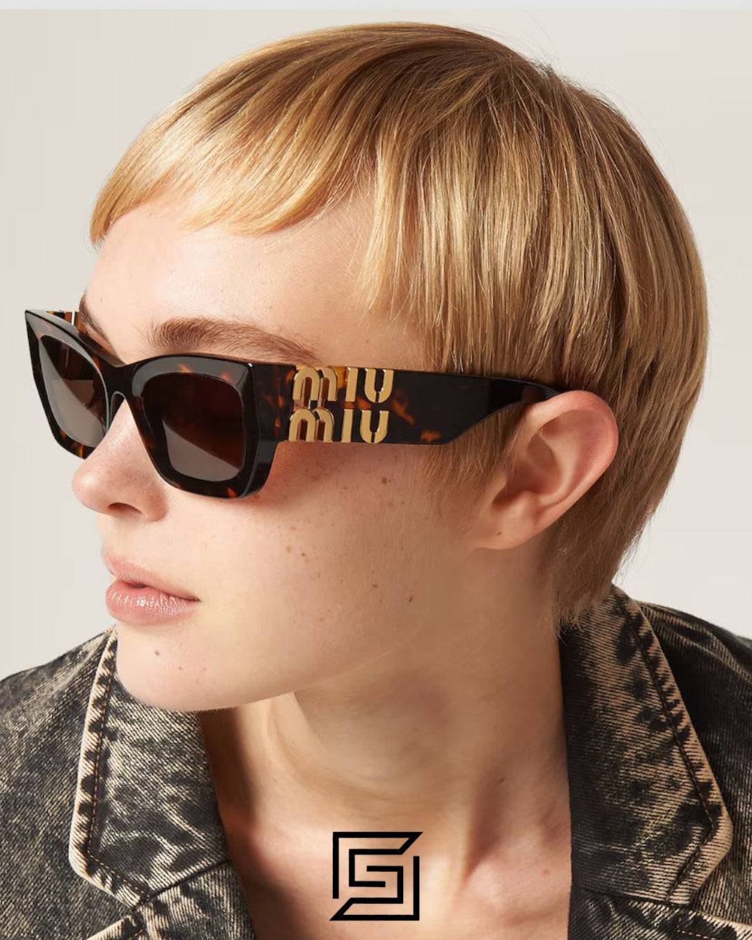 Miu Miu SMU09WS عدسات بنية وإطار بني بنقشة تايغر