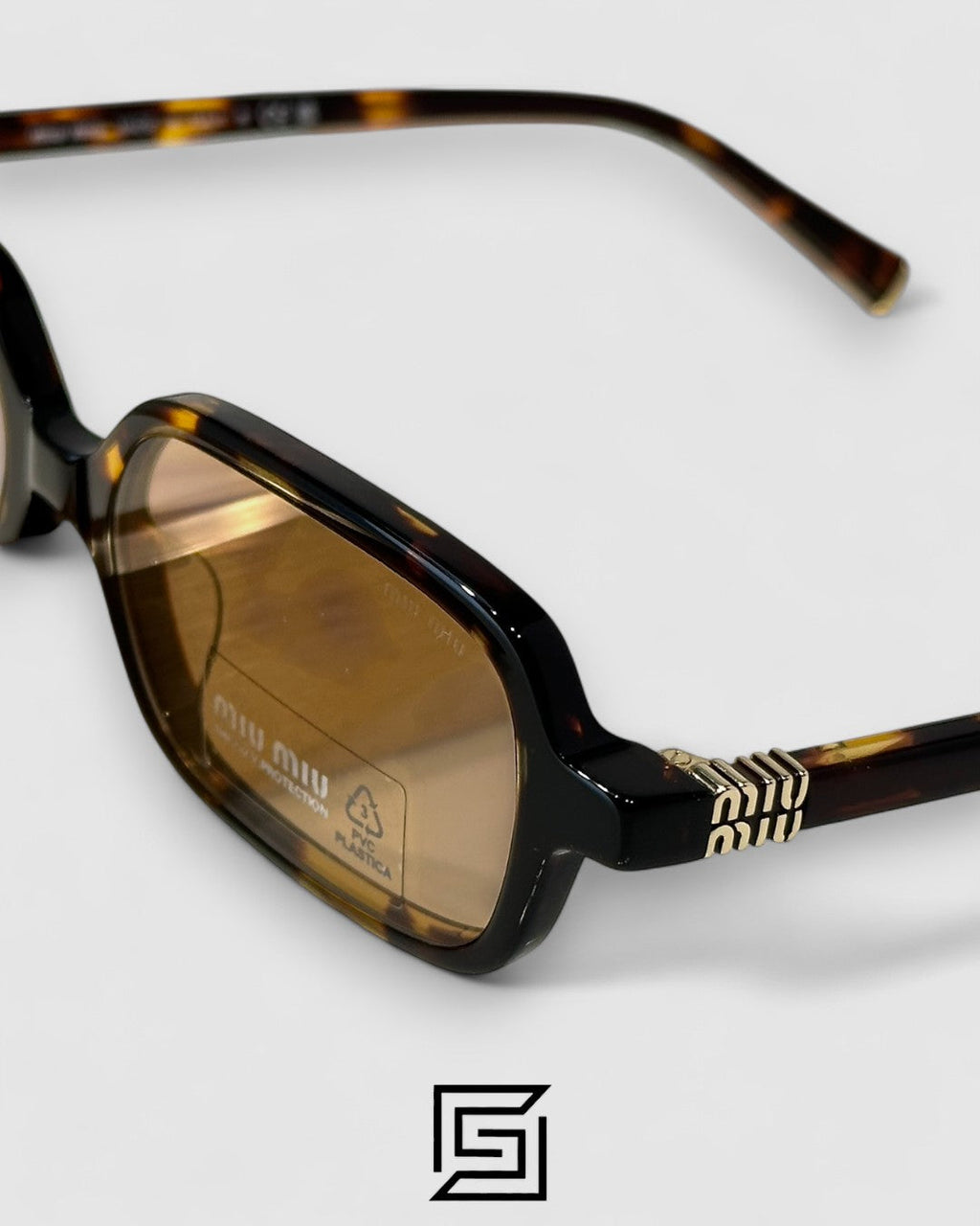 Miu Miu SMU11Z عدسات حمراء وإطار بلون بني التايجر