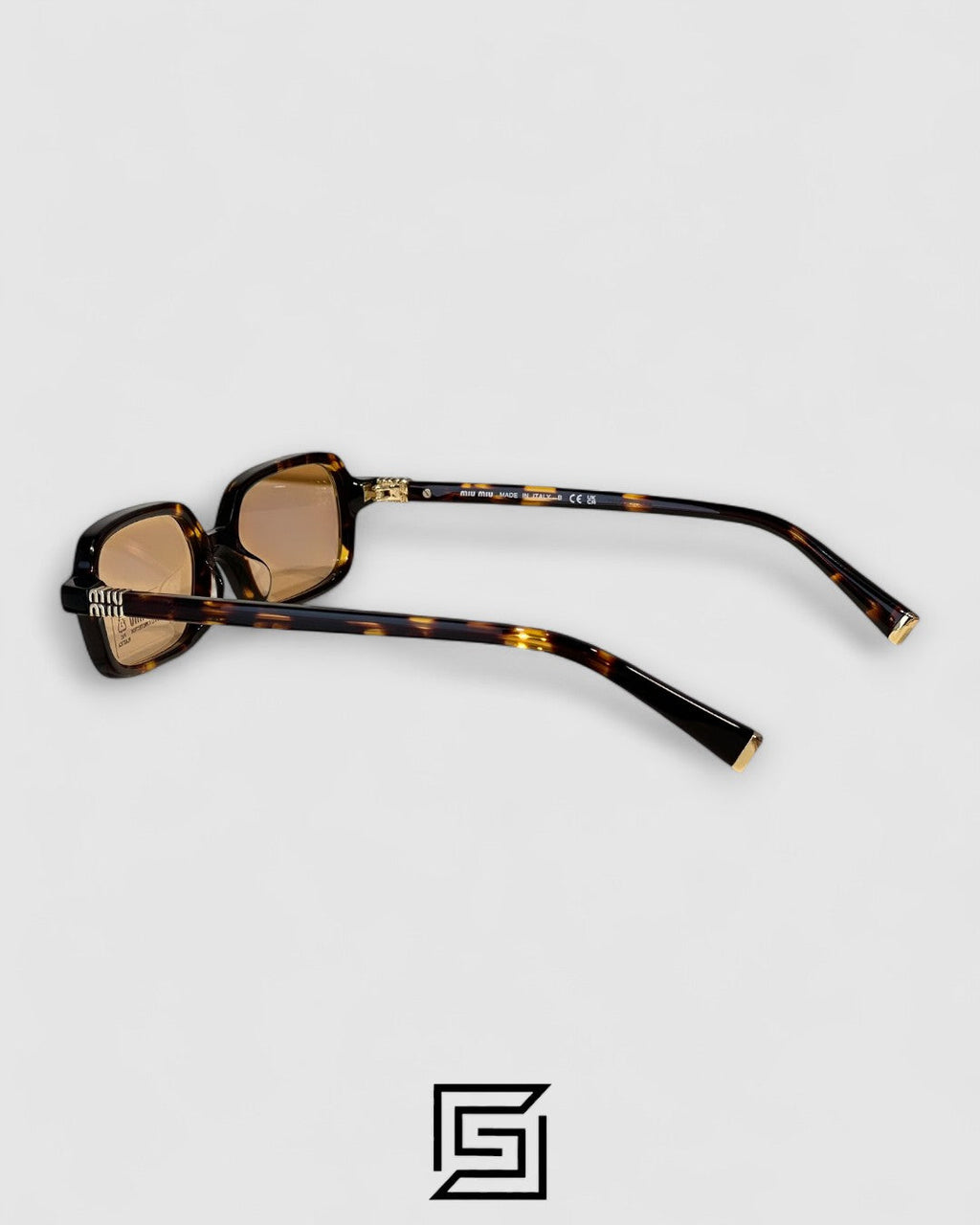 Miu Miu SMU11Z عدسات حمراء وإطار بلون بني التايجر