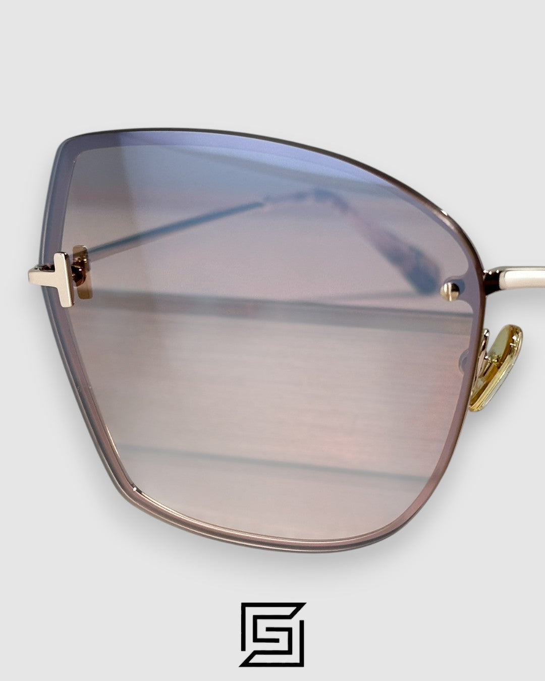 Tom Ford FT1107 عدسات مرآة بنية وإطار ذهبي