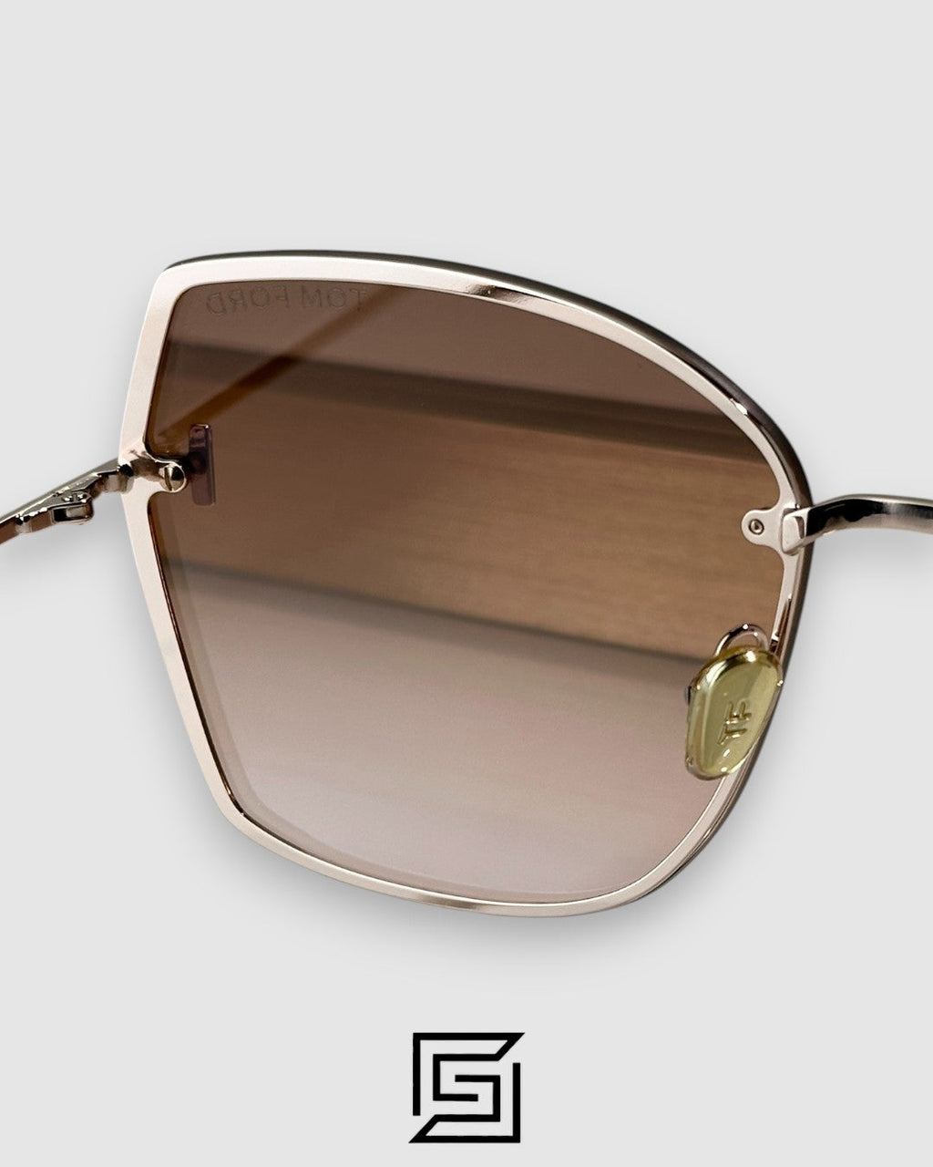 Tom Ford FT1107 عدسات مرآة بنية وإطار ذهبي