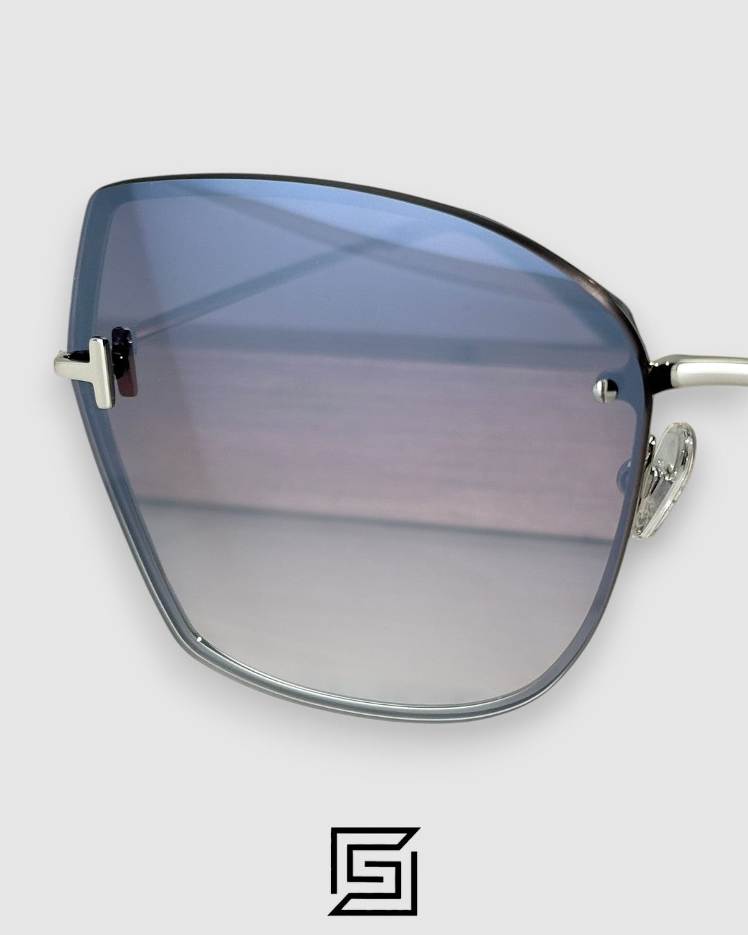 Tom Ford FT1107 عدسات فضية عاكسة وإطار فضي
