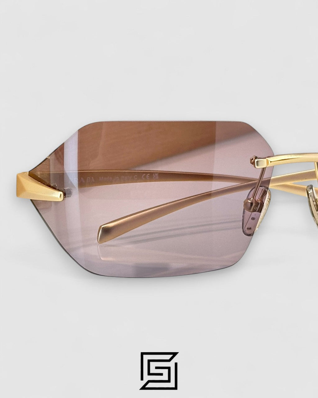 Prada SPR A55 Red Lenses Gold Frame