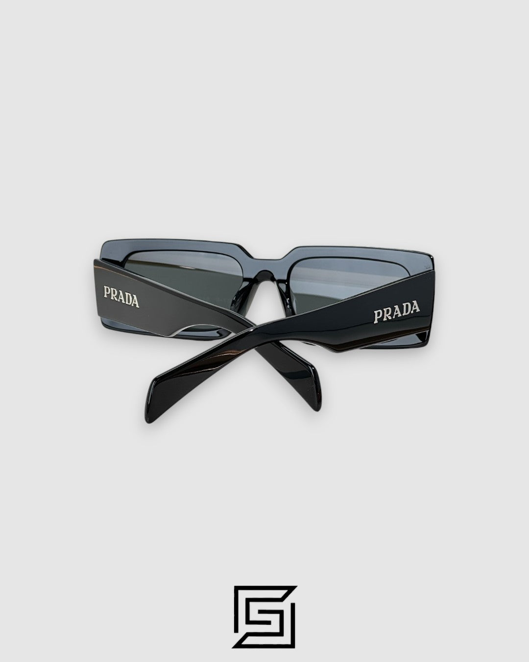 Prada SPR A07F عدسات سوداء إطار أسود