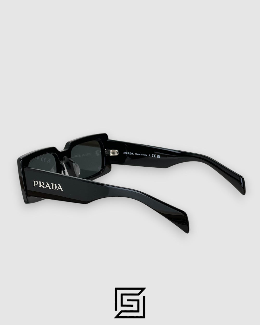 Prada SPR A07F عدسات سوداء إطار أسود