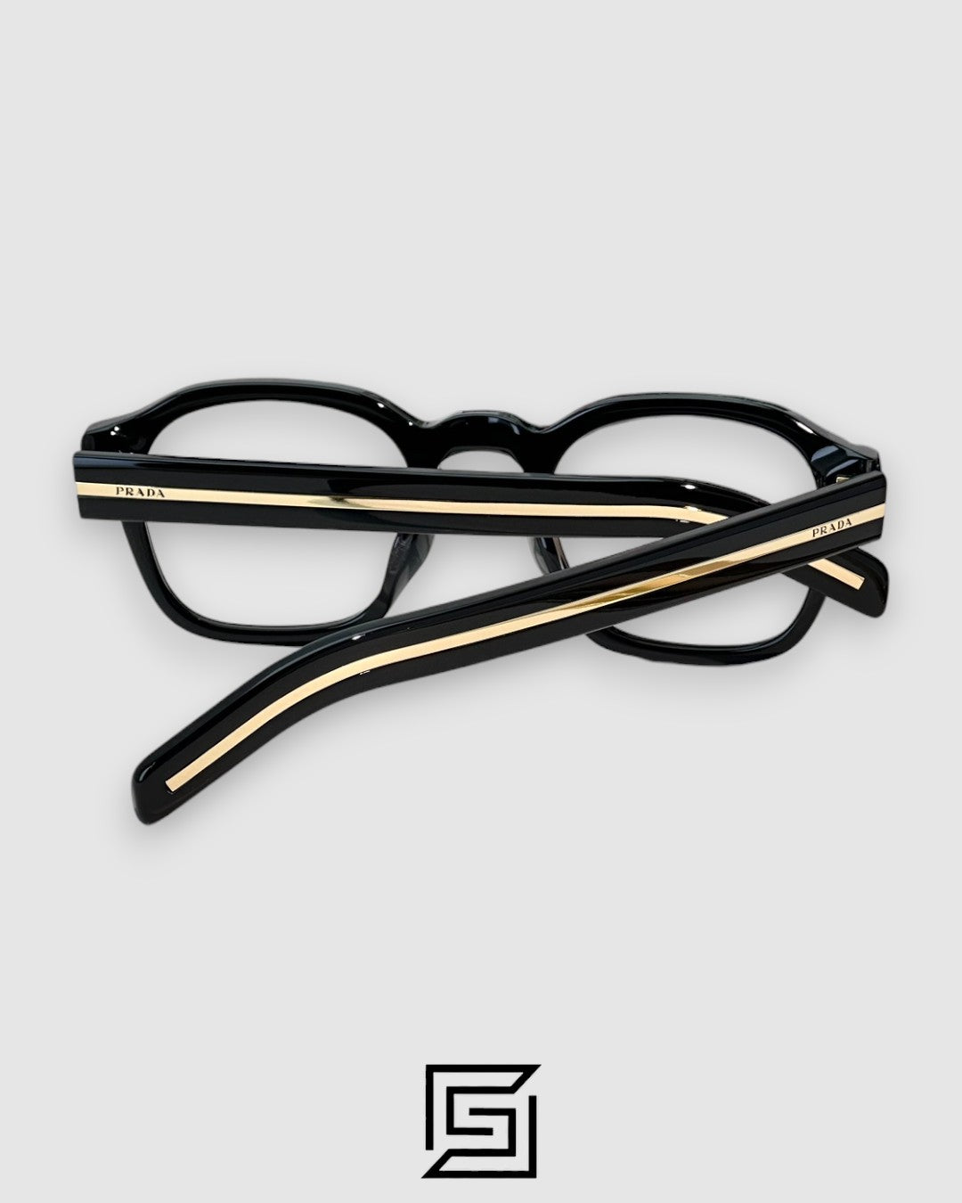 Prada SPR A16 إطار أسود معدن ذهبي عدسات سوداء