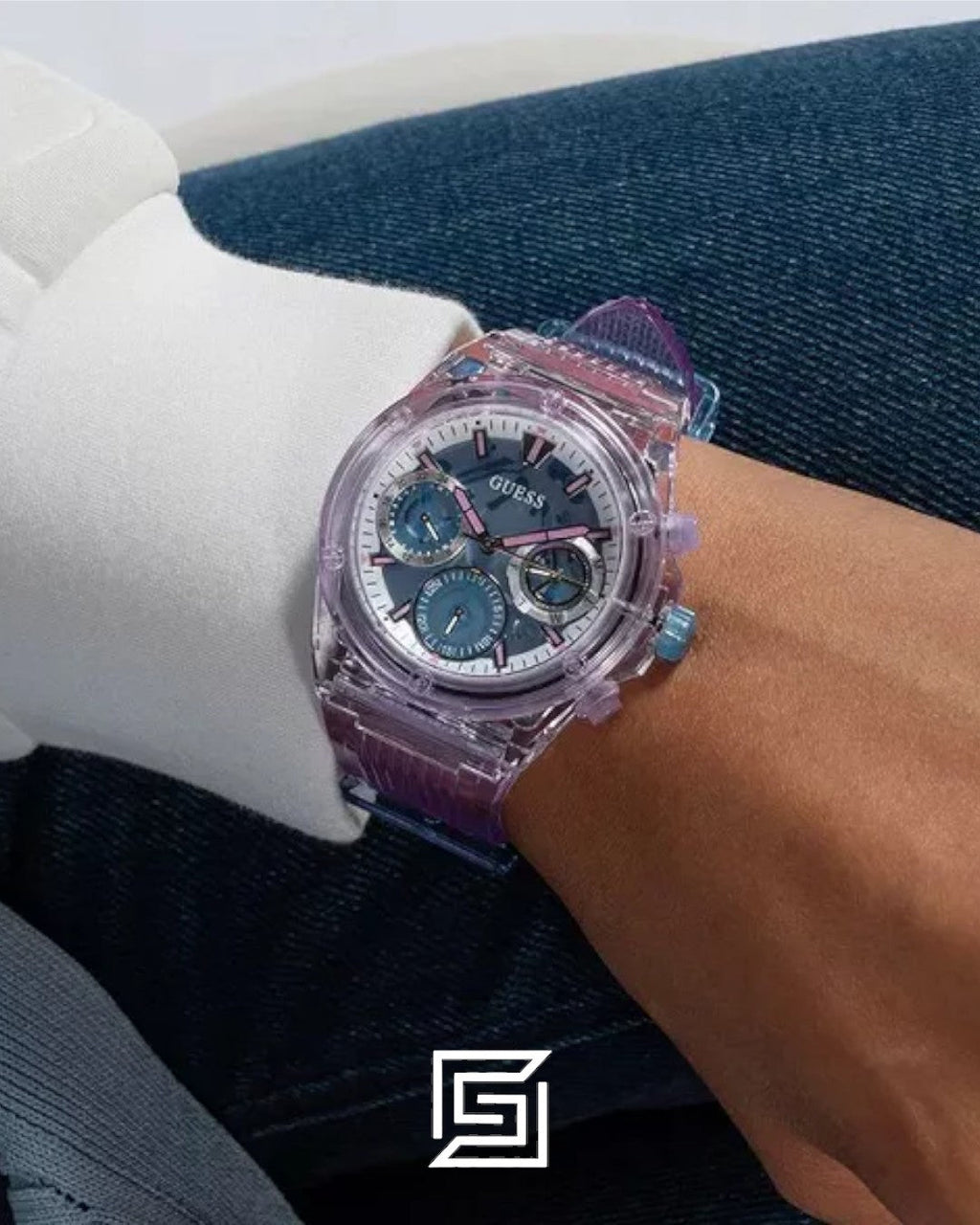 ساعة يد حريمي Guess GW0438L6 بهيكل شفاف أرجواني ومينا أزرق